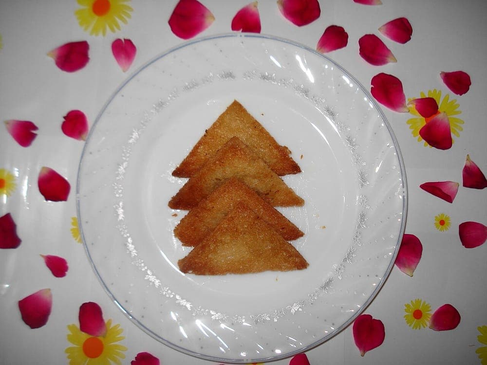Bread frying unevenly in hot oil