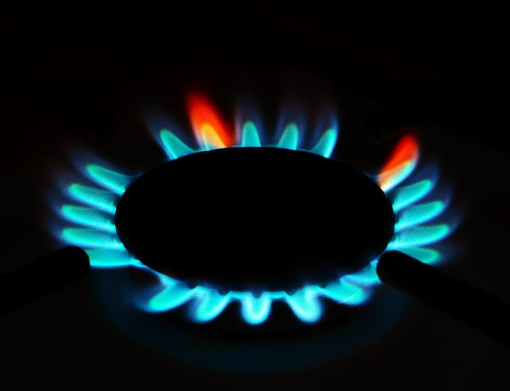 The blue flame of a gas burner