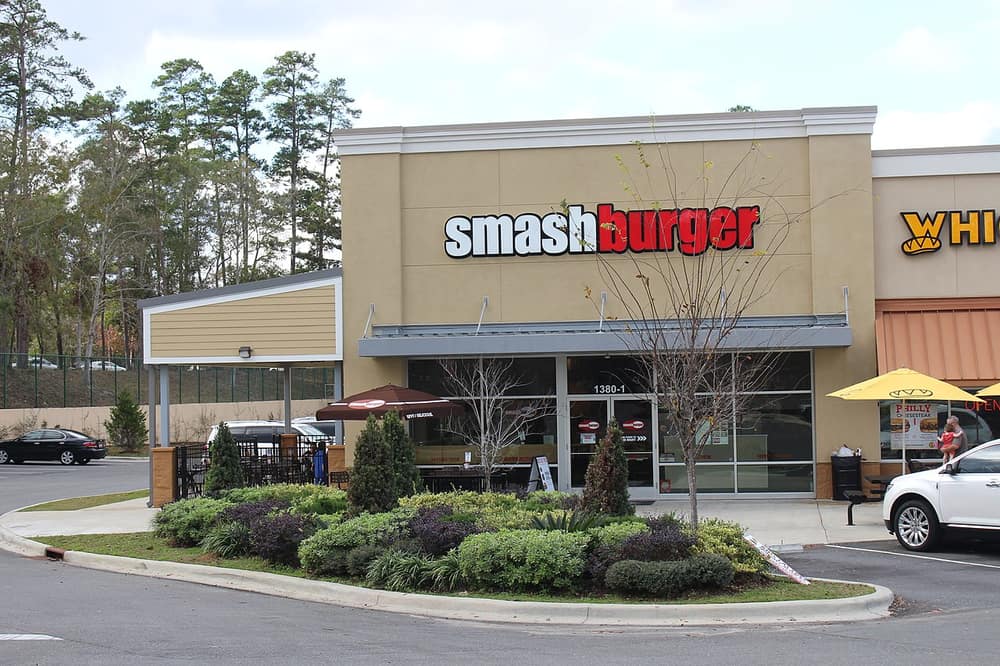 A smash burger with a dark seared crust